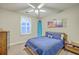 Bedroom featuring a bed with blue bedding, ceiling fan, neutral decor, and carpet at 406 Summers Dr, Summerville, SC 29485
