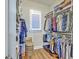Walk-in closet offers built-in shelving and ample storage for clothing and accessories at 406 Summers Dr, Summerville, SC 29485