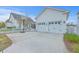 Property featuring a spacious driveway, two car garage and fenced in yard at 406 Summers Dr, Summerville, SC 29485