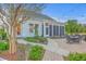 Inviting home exterior with brick patio, landscaped yard, and a screened-in porch at 406 Summers Dr, Summerville, SC 29485