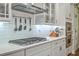 Well-equipped kitchen featuring a gas cooktop, stainless steel hood, and built-in double ovens is any chef's dream at 406 Summers Dr, Summerville, SC 29485