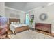 Comfortable bedroom featuring hardwood floors, a plush rug, and calming decor at 406 Summers Dr, Summerville, SC 29485