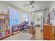 Cozy office with large window for natural light, custom bookshelves, and hardwood floors at 406 Summers Dr, Summerville, SC 29485
