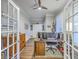Bright home office with french doors, built-in shelving, and ample desk space at 406 Summers Dr, Summerville, SC 29485