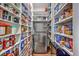Walk-in pantry with abundant shelving and stainless steel refrigerator provides optimal storage and organization at 406 Summers Dr, Summerville, SC 29485