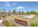 Community recreation area with benches, bocce ball courts, and lush landscaping at 406 Summers Dr, Summerville, SC 29485