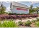 Summers Corner sign with manicured landscaping, lush greenery, and flowering bushes at 406 Summers Dr, Summerville, SC 29485