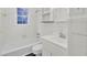 Bright bathroom features white tiled walls, a combined tub and shower, and modern fixtures for comfortable living at 407 Boone Hill Rd, Summerville, SC 29483