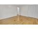 Bedroom with hardwood floors and closet doors for easy access and tidy storage at 407 Boone Hill Rd, Summerville, SC 29483