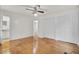 Bright bedroom with hardwood floors, closet space, and natural light creates a tranquil and functional living area at 407 Boone Hill Rd, Summerville, SC 29483