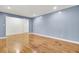 Open living room with hardwood floors and plenty of natural light at 407 Boone Hill Rd, Summerville, SC 29483