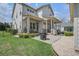 Spacious backyard with a patio, grill, and well-maintained landscaping at 4303 Misty Hollow Ln, Ravenel, SC 29470