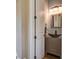 This bathroom features a vessel sink, decorative lighting, and a neutral color scheme at 4303 Misty Hollow Ln, Ravenel, SC 29470