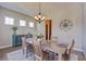 Spacious dining room with wooden furniture and decorative accents at 4303 Misty Hollow Ln, Ravenel, SC 29470