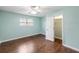 Clean bedroom with hardwood floors, closet, and natural light at 507 Stinson Dr # 3A, Charleston, SC 29407