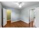 A bedroom with wood floors, ceiling fan, ensuite bathroom and closet at 507 Stinson Dr # 3A, Charleston, SC 29407