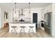 Bright and modern kitchen featuring stainless steel appliances, a kitchen island, and stylish pendant lights at 5223 Cottage Landing Dr, Summerville, SC 29485