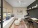 Bright office features a built-in desk, window seat, designer touches, and modern ceiling fan at 5223 Cottage Landing Dr, Summerville, SC 29485