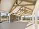 Open-air pavilion with fireplace, exposed timber beams, and ample seating at 5223 Cottage Landing Dr, Summerville, SC 29485