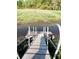 Wooden walkway leads to a private dock on the water at 5411 Nesting Pl, North Charleston, SC 29420