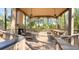 Expansive open-air pavilion featuring ample seating, a fireplace, and picturesque views at 5411 Nesting Pl, North Charleston, SC 29420
