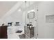 Modern bathroom showcasing a soaking tub, glass-enclosed shower, and designer vanity at 6 Beverly Rd, Charleston, SC 29407