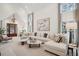 Bright living room featuring vaulted ceiling, comfortable seating, modern decor, and natural light at 6 Beverly Rd, Charleston, SC 29407