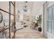 Bright living room with a vaulted ceiling, large windows, hardwood floors, and stylish decor at 6 Beverly Rd, Charleston, SC 29407