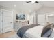 Spacious main bedroom with a vaulted ceiling, ample closet space, a mounted TV, and calming, neutral decor at 6 Beverly Rd, Charleston, SC 29407