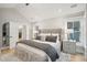 Bright main bedroom featuring a vaulted ceiling, ensuite access, and neutral decor at 6 Beverly Rd, Charleston, SC 29407