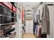Organized walk-in closet with custom shelving, drawers, and ample storage space for clothing at 6 Beverly Rd, Charleston, SC 29407