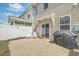 Backyard with a patio, white fence, outdoor chairs, and grill at 637 Hilchot Dr, Summerville, SC 29486
