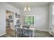Stylish dining area with modern furniture, perfect for entertaining and Gathering meals at 637 Hilchot Dr, Summerville, SC 29486