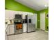 Modern kitchen with stainless steel appliances, quartz countertops, and open layout, perfect for cooking and entertaining at 8530 Bentwood Dr, North Charleston, SC 29406