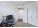 Bedroom with workspace, double door closet and entry to hallway at 861 Recess Point Dr, Moncks Corner, SC 29461