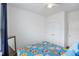 Bedroom with vibrant comforter, a ceiling fan and a large closet at 861 Recess Point Dr, Moncks Corner, SC 29461