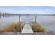 Private dock with metal stairway provides direct access to the calm lake at 861 Recess Point Dr, Moncks Corner, SC 29461