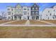 Charming townhome exteriors with coordinated color palettes and well-maintained landscaping at 861 Recess Point Dr, Moncks Corner, SC 29461
