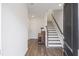 Welcoming home foyer featuring hardwood floors, staircase, and modern finishes at 861 Recess Point Dr, Moncks Corner, SC 29461