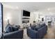 Inviting living room with modern fireplace, stylish furnishings, and abundant natural light at 861 Recess Point Dr, Moncks Corner, SC 29461