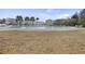 Inviting community swimming pool with pergola area and palm trees at 861 Recess Point Dr, Moncks Corner, SC 29461