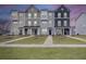 Charming row of townhomes with manicured lawns offers curb appeal and comfortable living at 861 Recess Point Dr, Moncks Corner, SC 29461