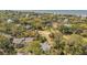 Overhead shot of real estate in wooded area near the ocean with several homes visible at 864 Club Cottage Rd, Edisto Beach, SC 29438
