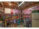 Well-organized basement with storage, shelving, and work area perfect for DIY projects and storage needs at 864 Club Cottage Rd, Edisto Beach, SC 29438