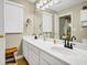 Elegant bathroom featuring a dual vanity with modern fixtures and ample counter space at 864 Club Cottage Rd, Edisto Beach, SC 29438