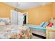 Cozy bedroom showcasing twin beds, ample closet space and a peaceful ambiance for restful nights at 864 Club Cottage Rd, Edisto Beach, SC 29438