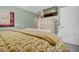 Comfortable bedroom with a serene decor, dresser and TV at 864 Club Cottage Rd, Edisto Beach, SC 29438