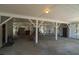 Spacious carport with white beams, lattice accents, and room for parking and storage, with access to the home at 864 Club Cottage Rd, Edisto Beach, SC 29438