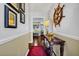 Elegant entryway with hardwood floors, decorative accents, and views into the living area at 864 Club Cottage Rd, Edisto Beach, SC 29438