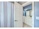 Bathroom featuring a vanity and a striped shower curtain at 8795 E Fairway Woods Cir, North Charleston, SC 29420